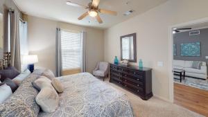 Two Bedroom Apartments for Rent in Conroe, Texas - Model-Bedroom-with-View-to-Living-Room-2