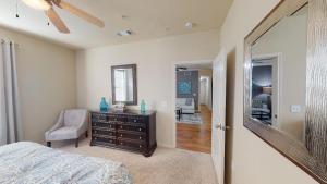 Two Bedroom Apartments for Rent in Conroe, Texas - Model-Bedroom-with-View-to-Living-Room