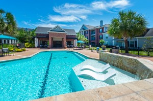 Apartments in Conroe, Texas - Pool & Patio Area with Clubhouse View (3)   