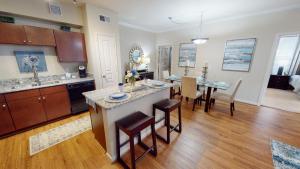 Two Bedroom Apartments for Rent in Conroe, Texas - Kitchen-with-Island-Dining-Room-and-View-to-Bedroom