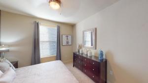 Two Bedroom Apartments for Rent in Conroe, Texas - Model-Bedroom-with-Large-Window
