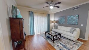 Three Bedroom Apartments for Rent in Conroe, Texas - Model-Living-Room-with-Sliding-Glass-Doors