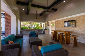 Apartments in Conroe, Texas - Covered Outdoor Seating Area & TV   