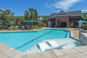Apartments in Conroe, Texas - Swimming Pool with Tanning Shelf