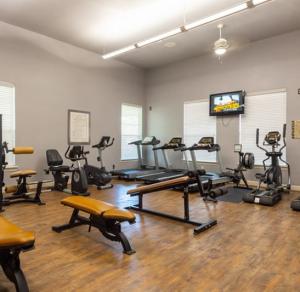 Apartments in Conroe, Texas - Fitness Center with TV